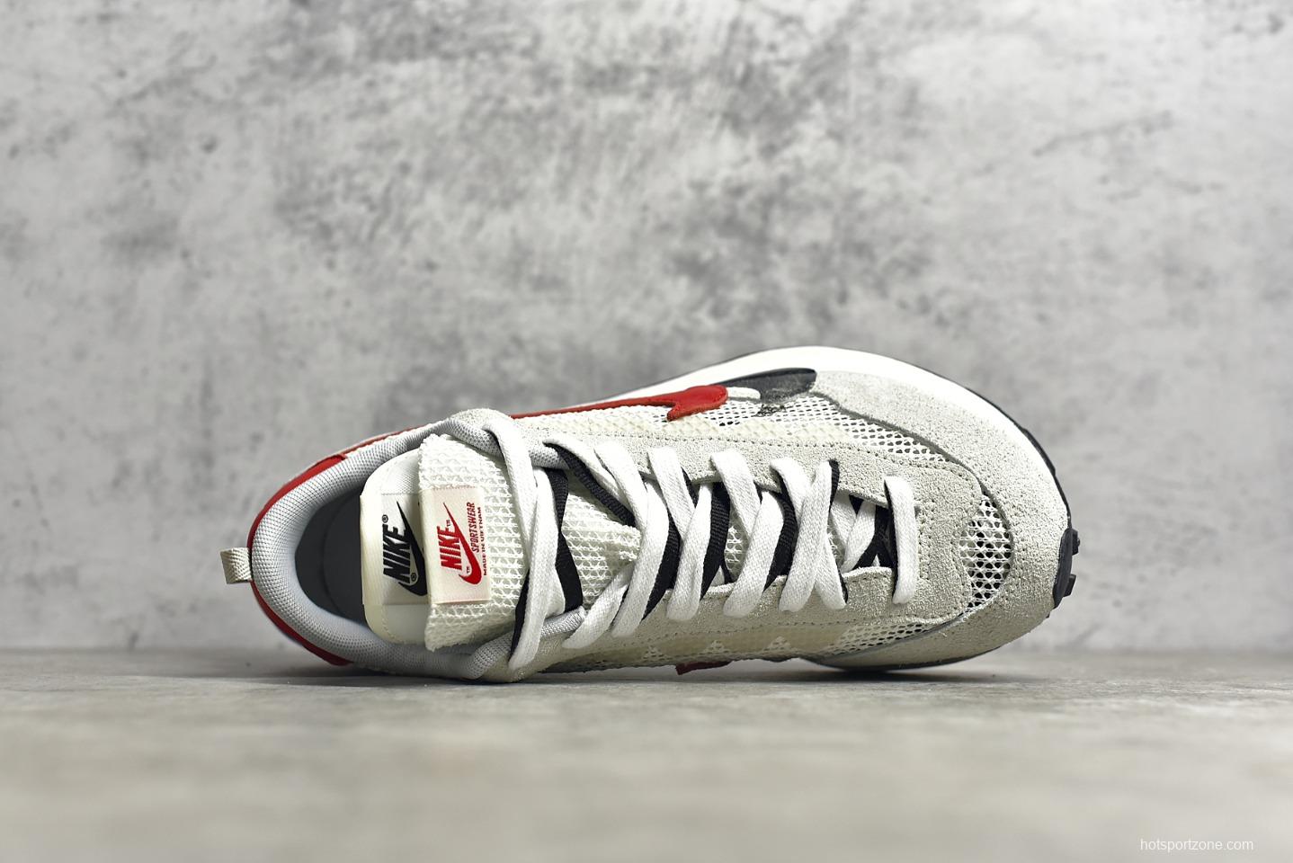 Sacai X Nike VaporWaffle “Royal Fuchsia”