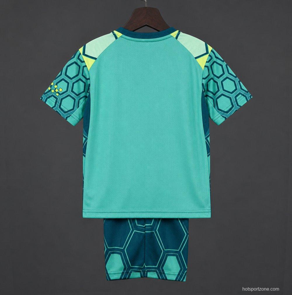 26/27 Kids Manchester City Vibrant Green Goalkeeper Jersey With Dark Blue Geometric Pattern.